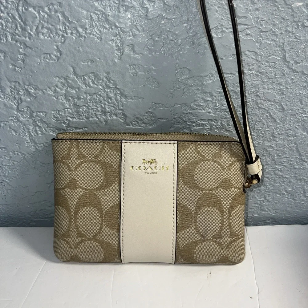 COACH Corner Zip Wristlet in Signature Canvas Stripe Gold Tone Logo Cream/Sand